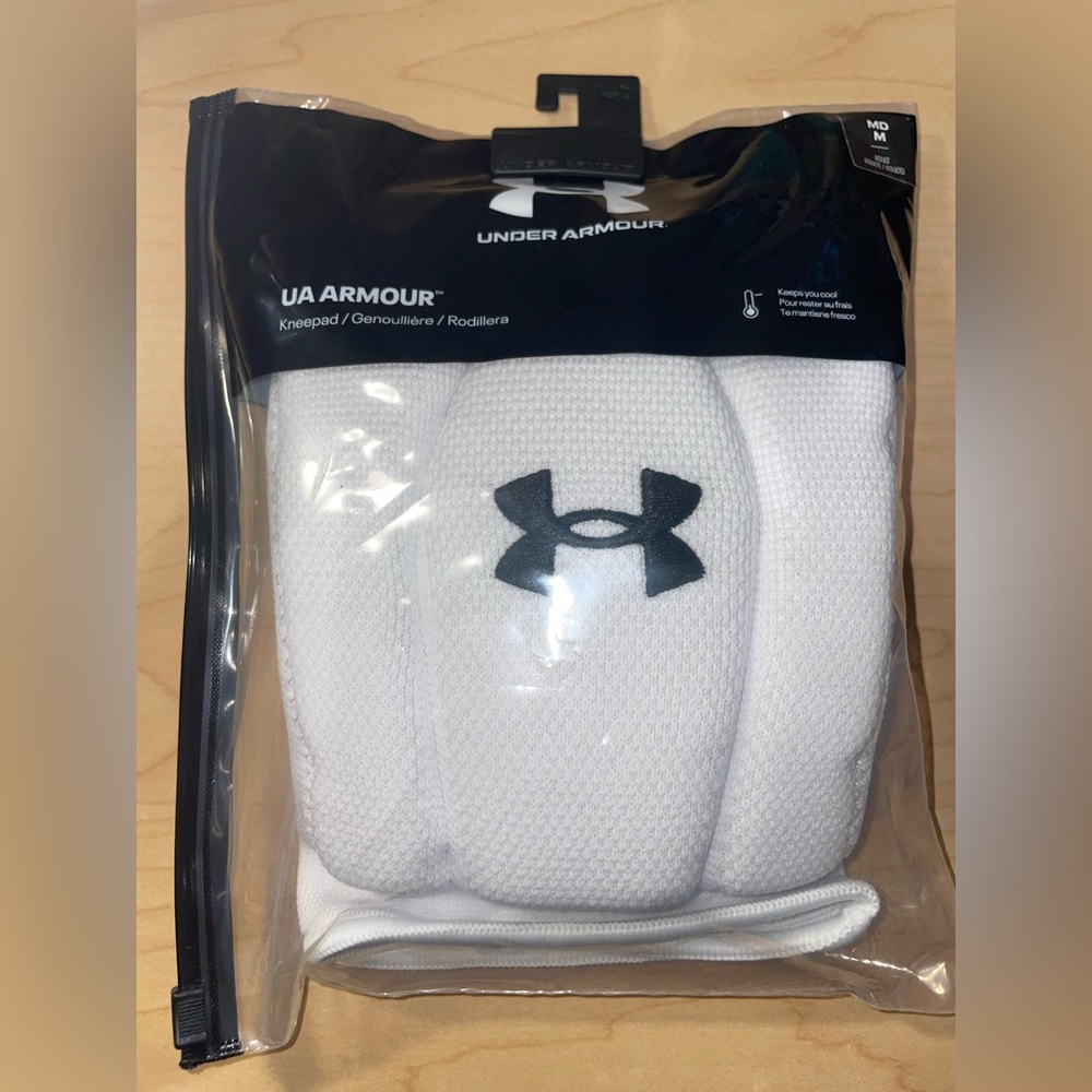 Set of White under armor volleyball knee pads. Brand new.